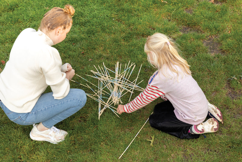 Load image into Gallery viewer, Bamboo giant Mikado outdoor game set by XD Collection with large bamboo sticks and balls for lawn play.