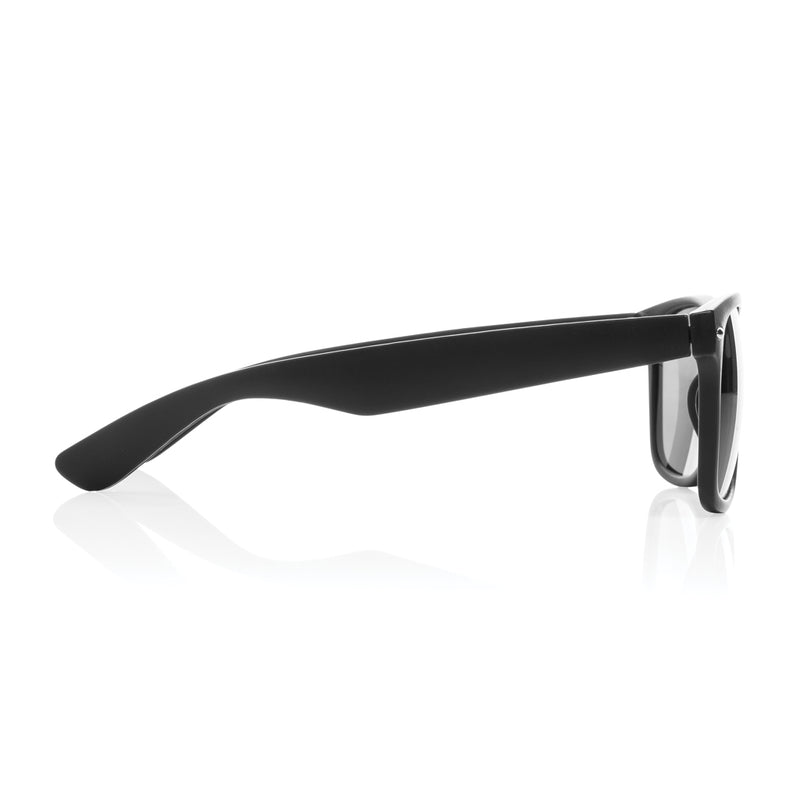 Load image into Gallery viewer, Pair of outdoor sunglasses made from recycled PC plastic by XD Collection, featuring a stylish frame and tinted lenses.