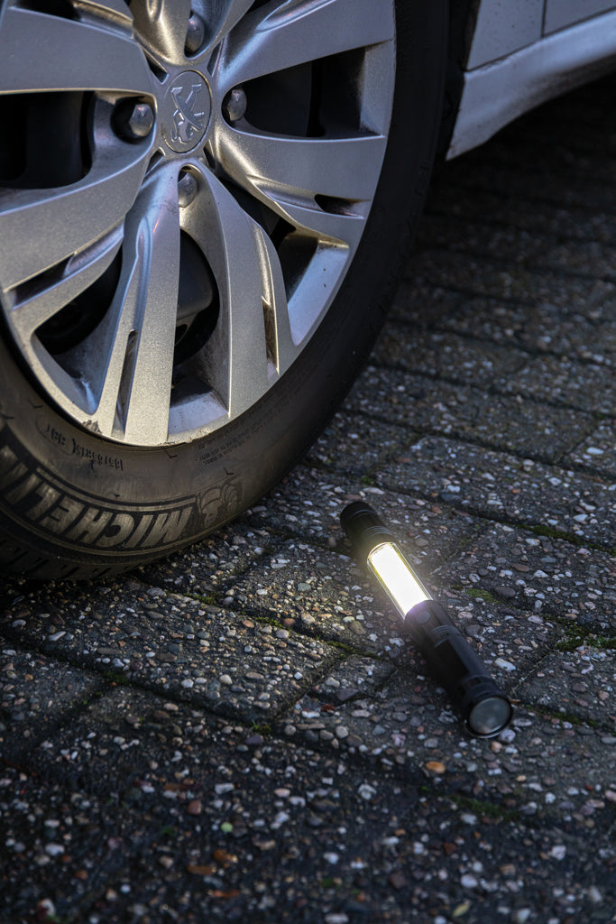 Load image into Gallery viewer, Large telescopic LED torch with COB light from XD Collection, featuring adjustable extension and bright illumination.