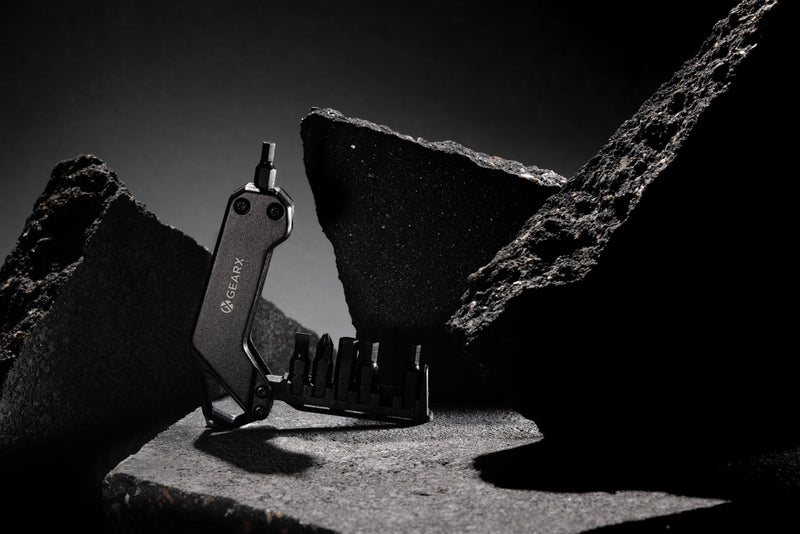 Load image into Gallery viewer, GearX screwdriver tool from Tools & Torches collection, featuring a silver handle and interchangeable bits on a white background.