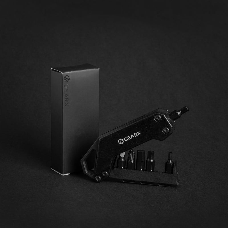 Load image into Gallery viewer, GearX screwdriver tool from Tools & Torches collection, showing a close-up of the ergonomic handle and metal tip in use.