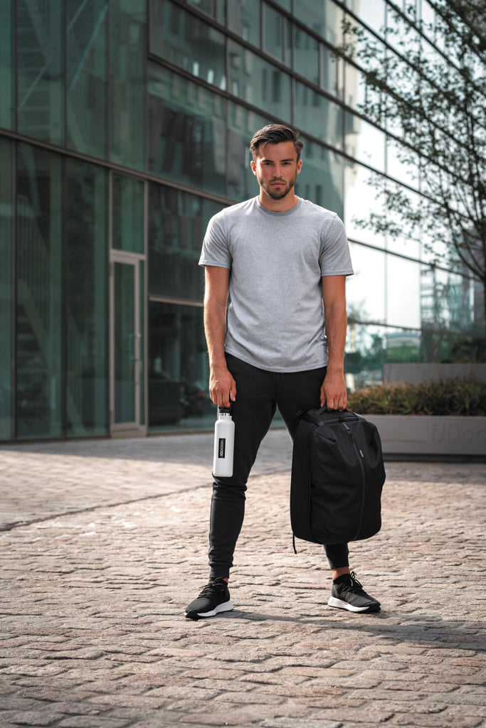 Load image into Gallery viewer, XD Design Flex Gym bag for bags and travel, showing a sleek, black carrying bag with multiple compartments and modern design.