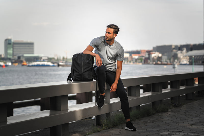 Load image into Gallery viewer, XD Design Flex Gym bag for travel and workouts, featuring a sleek black design with multiple compartments and adjustable straps.