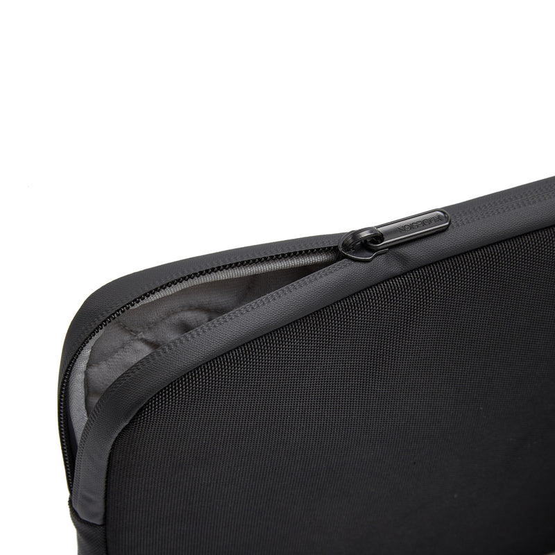 Load image into Gallery viewer, XD Design 14-inch laptop sleeve in sleek black fabric, designed for bags and travel protection.