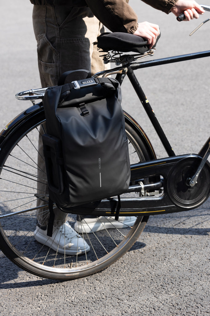 Load image into Gallery viewer, Urban water-resistant bike backpack by XD Design with multiple compartments and adjustable straps for cycling and travel.