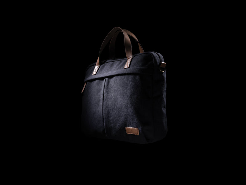 Load image into Gallery viewer, 16 oz recycled canvas laptop bag from XD Collection, showing a stylish green eco-friendly bag with handles and zipper closure.