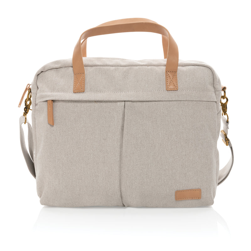 Load image into Gallery viewer, 16 oz recycled canvas laptop bag from XD Collection with adjustable strap and multiple compartments, designed for eco-friendly travel.