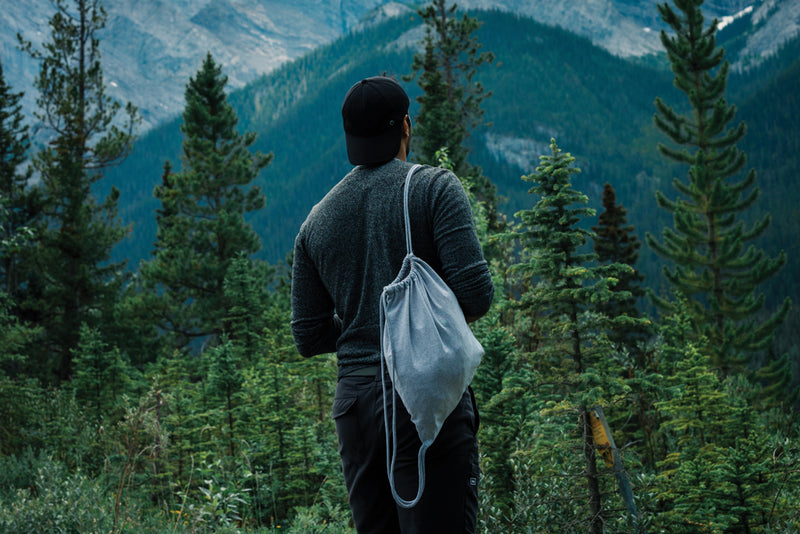 Load image into Gallery viewer, Recycled cotton drawstring backpack from XD Collection Impact AWARE™ for bags and travel, featuring a lightweight 145g design with drawstring closure.