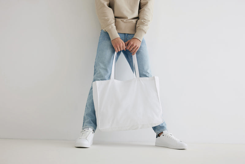 Load image into Gallery viewer, Cotton shopper bag from XD Collection, 145g lightweight eco-friendly tote with durable handles and spacious interior.