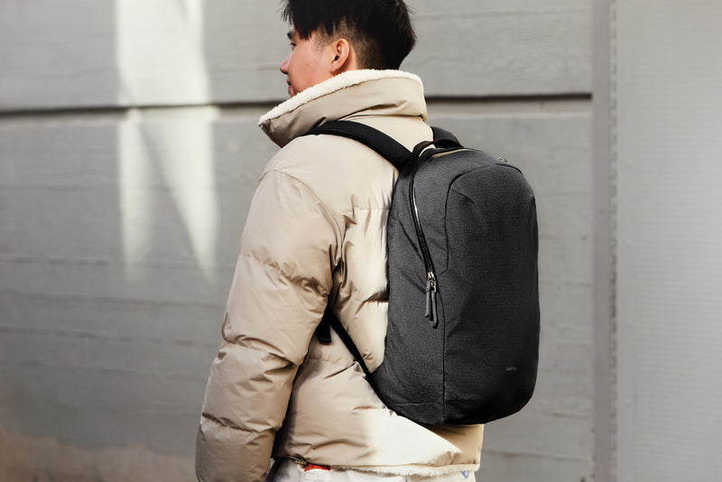 Load image into Gallery viewer, Bellroy Via Backpack in sleek black, showing its minimalist design, adjustable straps, and multiple compartments for travel and everyday use.