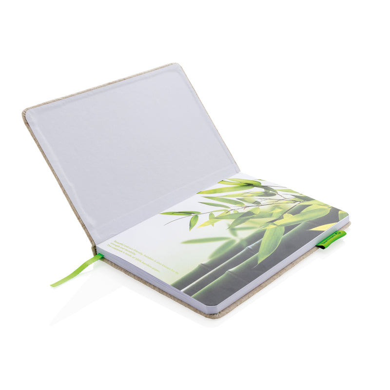 Load image into Gallery viewer, A5 jute notebook from XD Collection with a natural woven cover and spiral binding, suitable for note-taking and journaling.