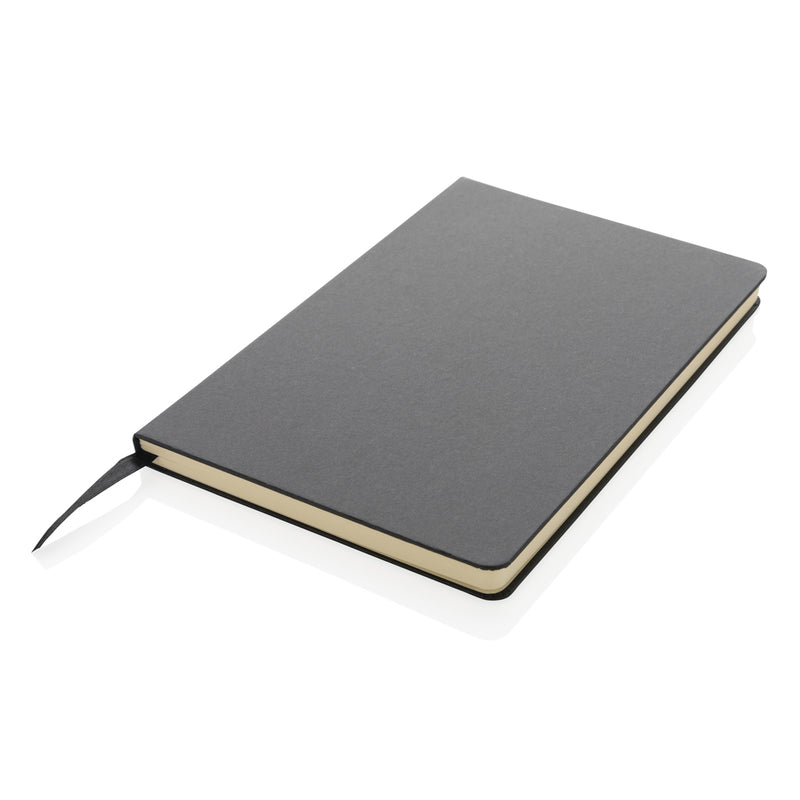 Load image into Gallery viewer, A5 hardcover notebook from XD Collection with a sleek black cover, open pages showing lined paper for note-taking or journaling.