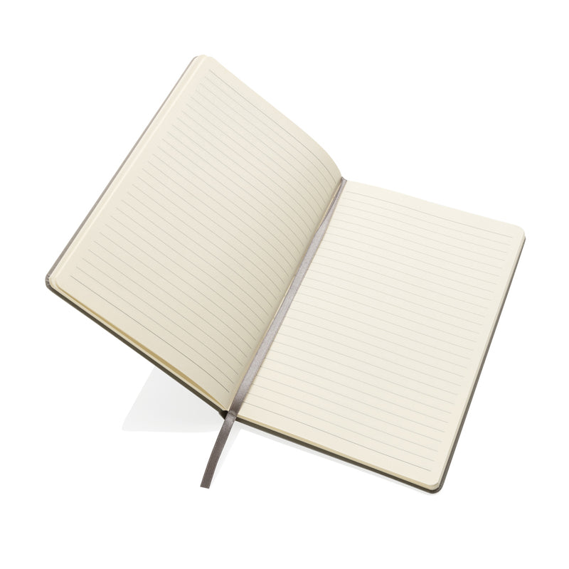 Load image into Gallery viewer, A5 hardcover notebook from XD Collection with a sleek black cover, ideal for writing and note-taking.