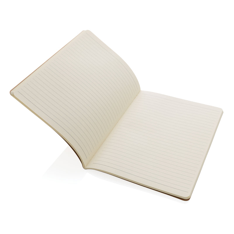 Load image into Gallery viewer, A5 softcover notebook from XD Collection with a smooth black cover and visible spiral binding on the side.