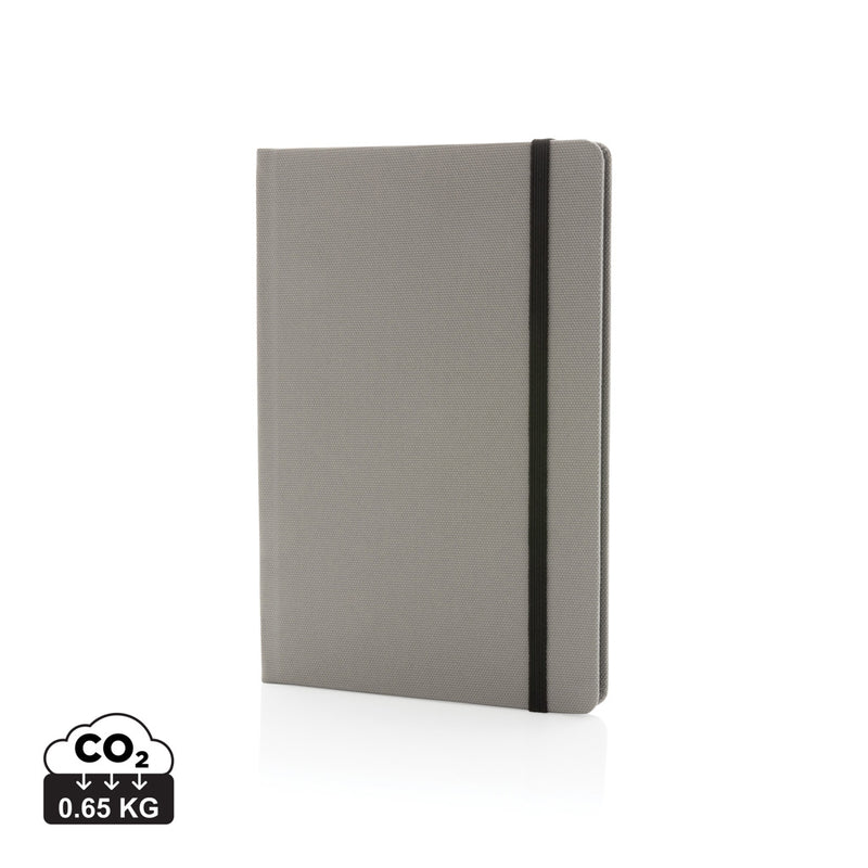 Load image into Gallery viewer, Gray GRS certified RPET A5 notebook from XD Collection with eco-friendly cover and lined pages.