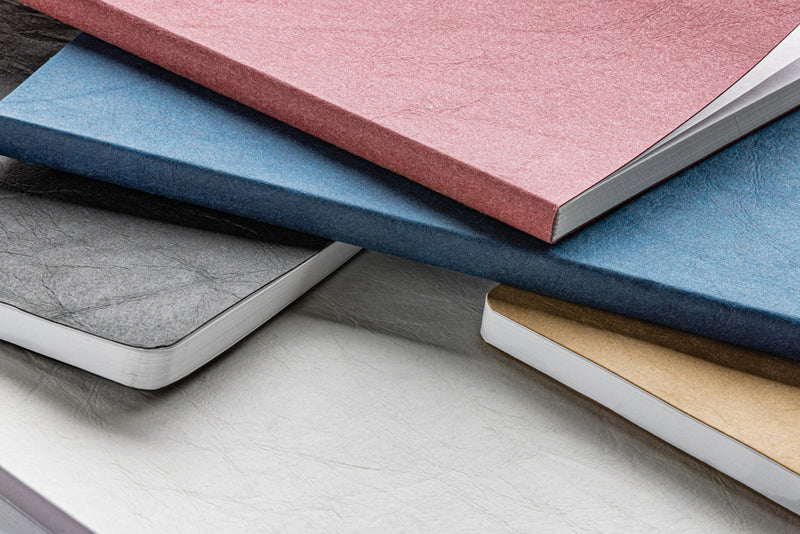 Load image into Gallery viewer, Salton A5 GRS certified recycled paper notebook from XD Collection, showing a close-up of the eco-friendly cover and pages.