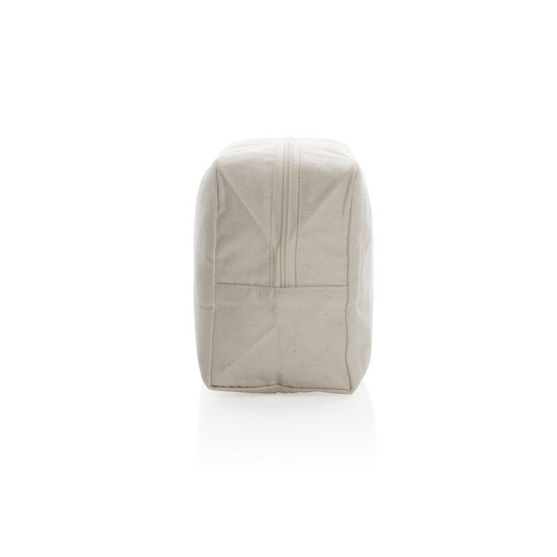 Load image into Gallery viewer, Undyed Impact Aware™ 285 gsm rcanvas toiletry bag from XD Collection, showing the durable, natural fabric and travel-ready design.
