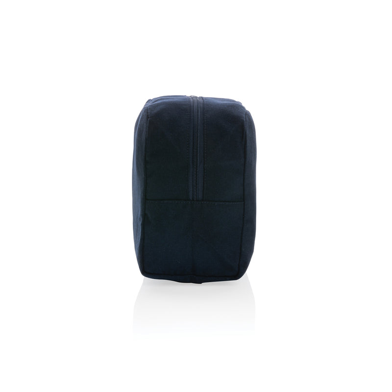 Load image into Gallery viewer, Undyed Impact Aware™ 285 gsm rcanvas toiletry bag from XD Collection, showing close-up of durable, natural fabric and zipper closure.