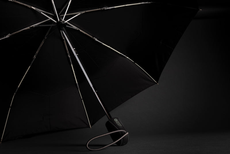Load image into Gallery viewer, Swiss Peak Traveller 21-inch automatic umbrella open with navy canopy and sturdy handle, compact and portable for travel.