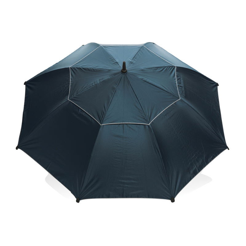 Load image into Gallery viewer, XD Xclusive 27-foot hurricane storm umbrella opened outdoors, large waterproof umbrella designed for high wind protection.