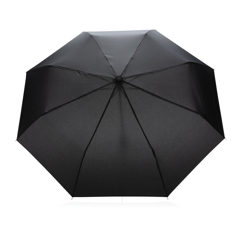 Load image into Gallery viewer, 20.5-inch Impact AWARE™ RPET mini umbrella by XD Collection, compact rain shield with colorful canopy open in a sunny setting.