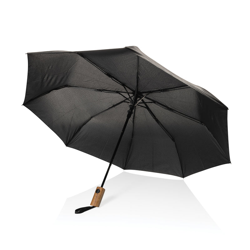 Load image into Gallery viewer, Kaycey 21-inch AWARE™ RPET acacia wood mini auto open umbrella from XD Collection, showcasing its compact design and wooden handle.