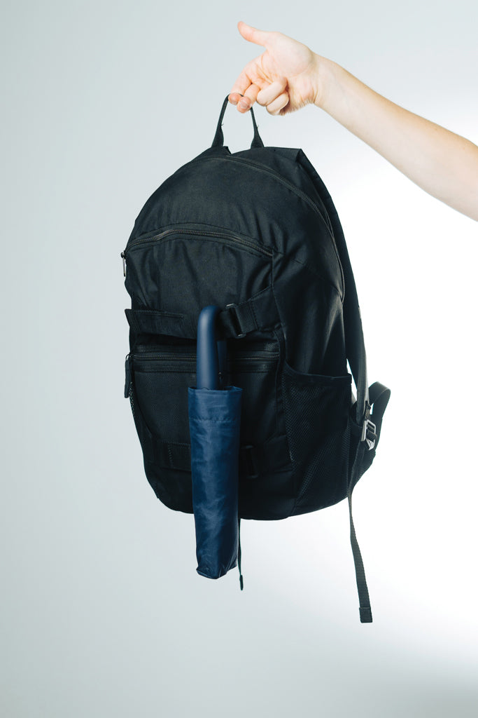 Load image into Gallery viewer, XD Collection Yara 21-inch AWARE™ RPET solid color umbrella with carabiner, featuring a lightweight design and vibrant fabric.