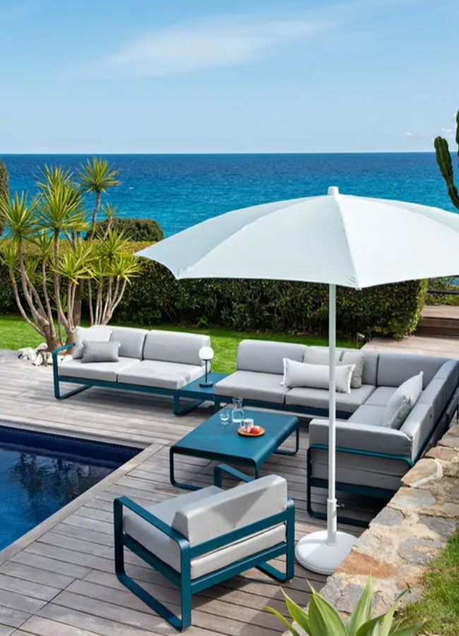 Load image into Gallery viewer, Fermob Shadoo outdoor table umbrella with a 250 cm diameter, providing shade for patios and outdoor dining areas.