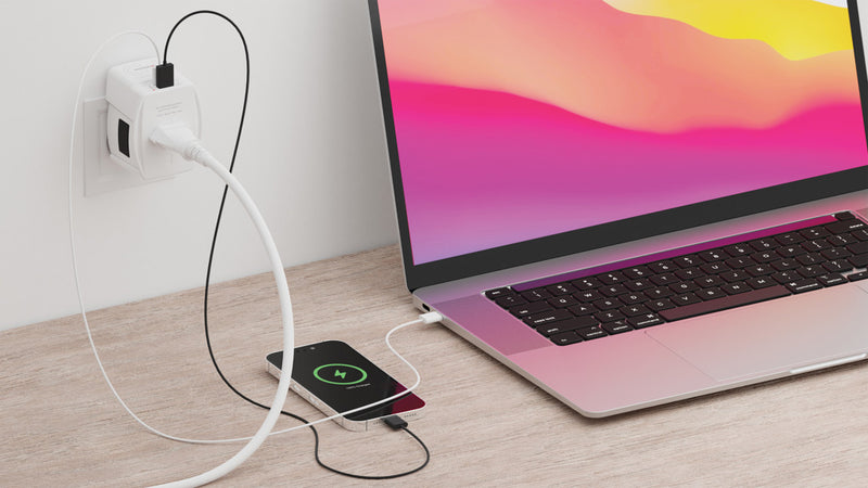Load image into Gallery viewer, Skross SKROSS World Travel Adapter MUV 65W PD with USB-C cable for phone and tablet charging, compact travel accessory.