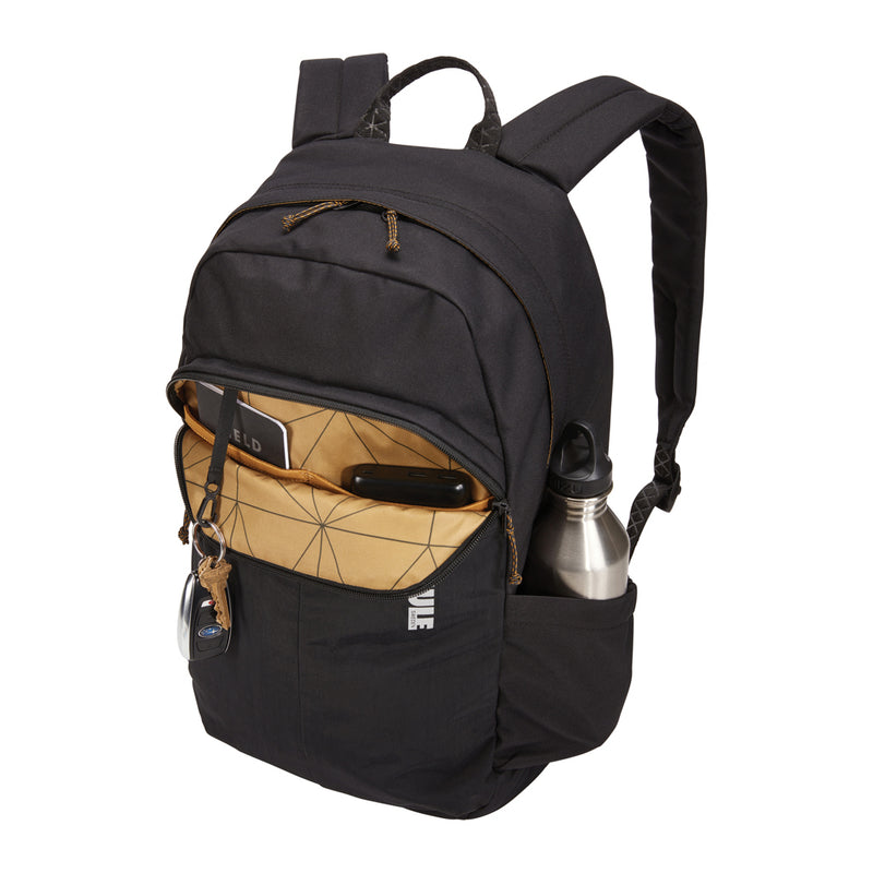 Load image into Gallery viewer, Thule Indago 23L backpack in black with multiple compartments and padded straps, designed for travel and everyday use.