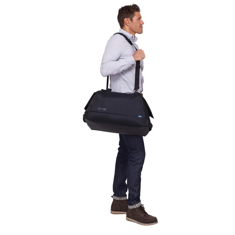 Load image into Gallery viewer, Thule Subterra 2 Duffel 35L travel bag with sturdy handles and compact design, ideal for carry-on travel and weekend trips.