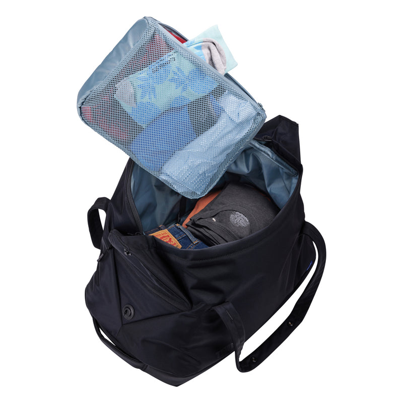 Load image into Gallery viewer, Thule Subterra 2 Duffel 35L in black with handles and adjustable shoulder strap, designed for travel and carrying essentials.