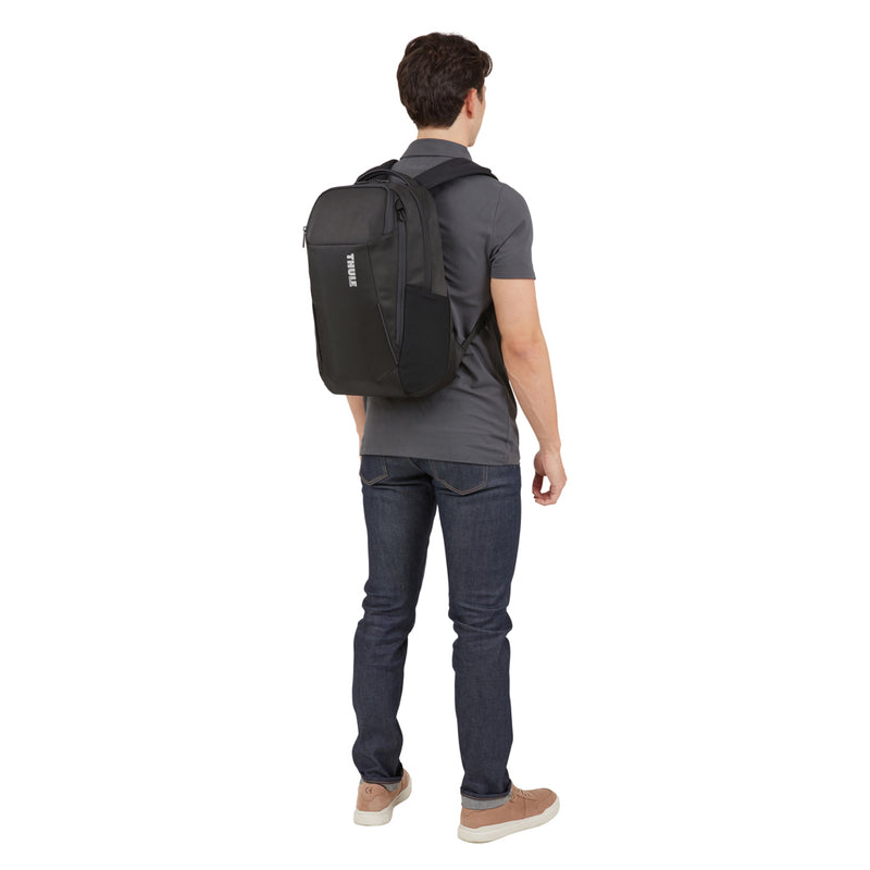 Load image into Gallery viewer, Thule Accent Recycled Backpack 23L in black, featuring multiple compartments and padded straps, designed for comfortable everyday carrying.