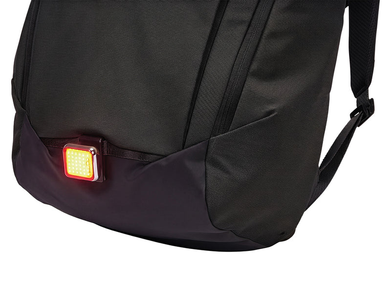 Load image into Gallery viewer, Thule Paramount 20L backpack in black with multiple compartments and padded shoulder straps, designed for travel and daily use.