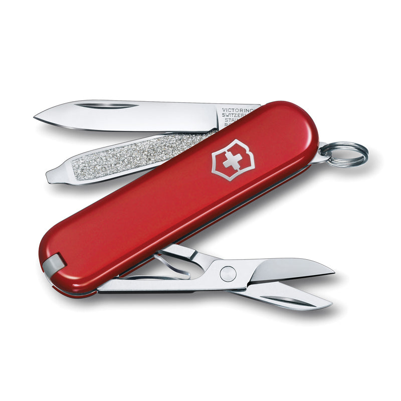 Load image into Gallery viewer, Victorinox Classic SD pocket knife with 7 functions, featuring a compact Swiss Army tool with scissors, blade, and screwdriver.