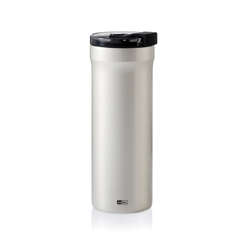 Load image into Gallery viewer, AdHoc Thermal Mug Pulse in stainless steel with black lid, designed for hot and cold beverages, in a sleek home and living setting.