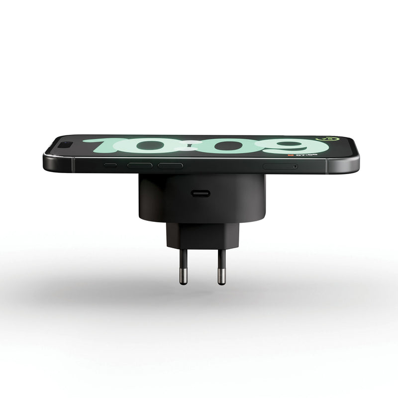 Load image into Gallery viewer, Zens wireless charging adapter for phones and tablets, compact design with USB-C port, black color, in close-up view