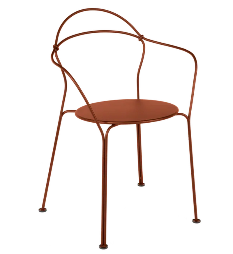 Load image into Gallery viewer, Red ochre Fermob Airloop lounge chair with sleek metal design, outdoor furniture for comfortable seating.