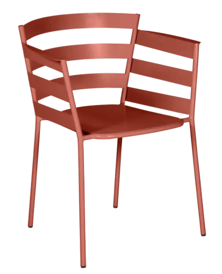 Load image into Gallery viewer, Red Ochre Fermob RYTHMIC outdoor armchair with a modern design, featuring a curved metal frame and comfortable seating.