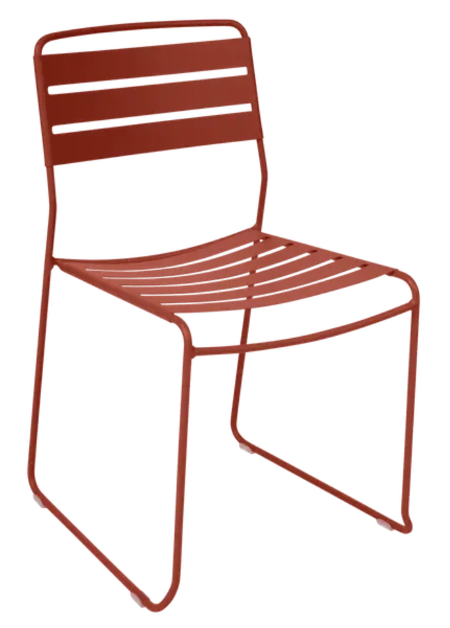 Load image into Gallery viewer, Red Fermob Surprising outdoor chair with a sleek, modern design, ideal for outdoor dining or patio spaces.