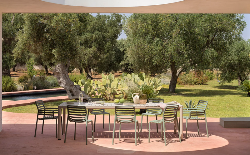Load image into Gallery viewer, Extendable Tevere 210 outdoor table by Nardi, showing a sleek wooden surface with a modern design, perfect for outdoor dining.