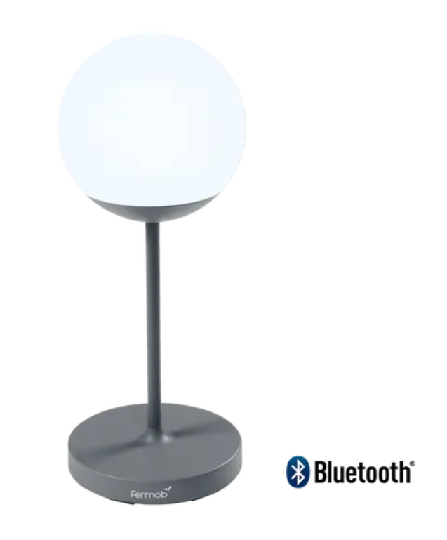 Load image into Gallery viewer, Storm Grey Fermob MOOON! wireless table lamp, 63 cm tall, with a sleek, modern design and glowing light.