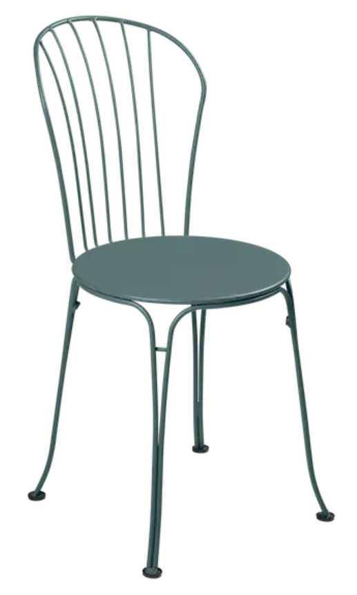 Load image into Gallery viewer, Storm grey Fermob OPÉRA+ metal outdoor chair with sleek design, suitable for restaurant or patio seating, featuring sturdy metal construction.