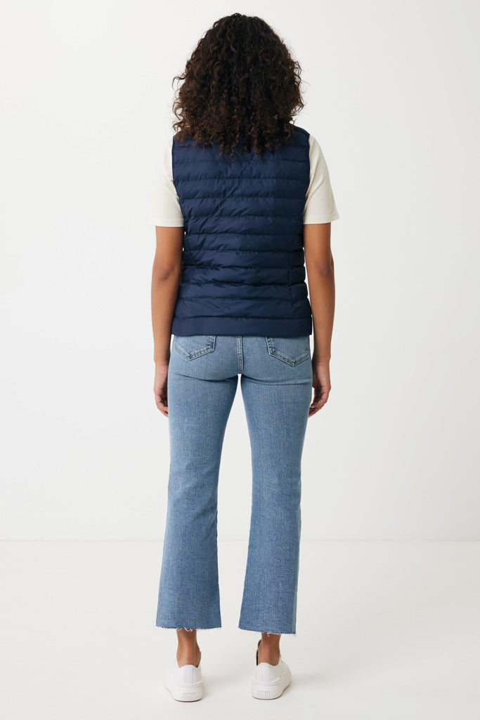 Load image into Gallery viewer, Recycled polyester Mer women bodywarmer by iqoniq, lightweight textile with a sleek design, shown on a plain background.