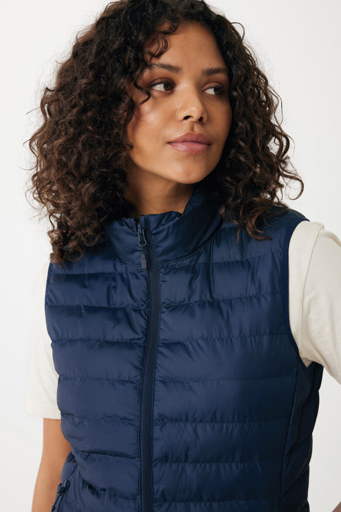 Load image into Gallery viewer, Mer women recycled polyester bodywarmer by iqoniq, close-up of lightweight textile with quilted design and branding details.