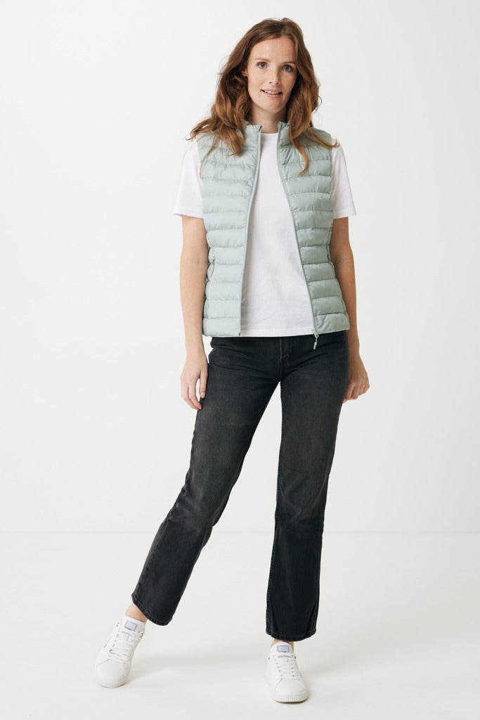 Load image into Gallery viewer, Mer women recycled polyester bodywarmer by iqoniq, lightweight textile with a sleek design, shown in a close-up view.