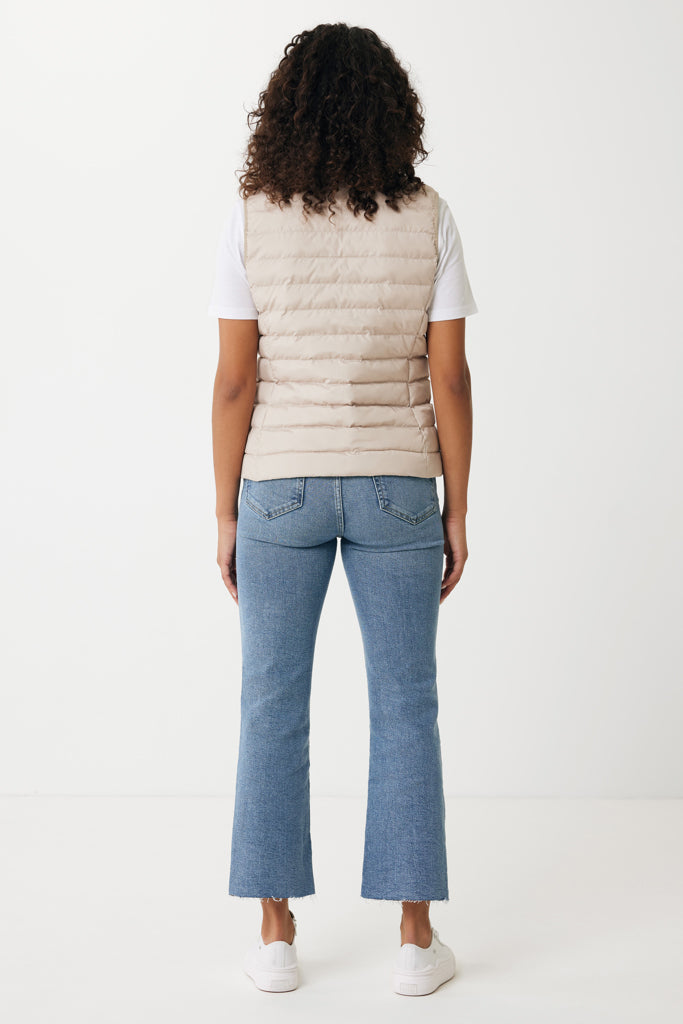 Load image into Gallery viewer, Mer women recycled polyester bodywarmer by iqoniq, showcasing a lightweight textile with a sleek, eco-friendly design.