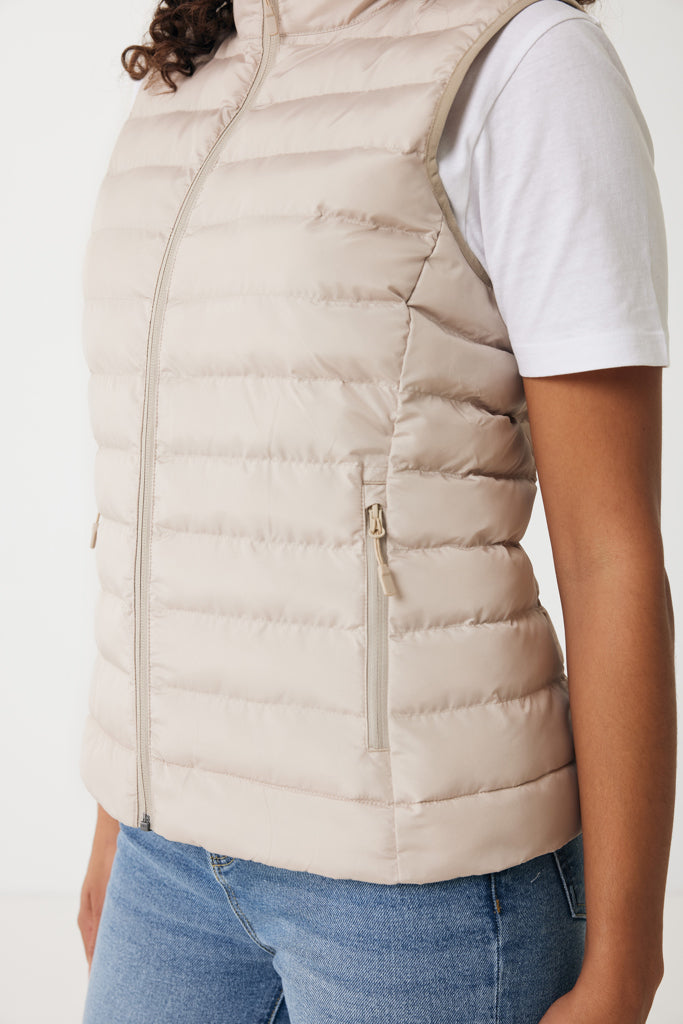 Load image into Gallery viewer, Mer women recycled polyester bodywarmer by iqoniq, featuring a sleek textile design with a high collar and quilted texture.