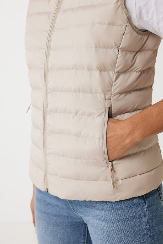 Load image into Gallery viewer, Mer women recycled polyester bodywarmer by iqoniq, lightweight textile with a fitted design and high collar, shown in black fabric.