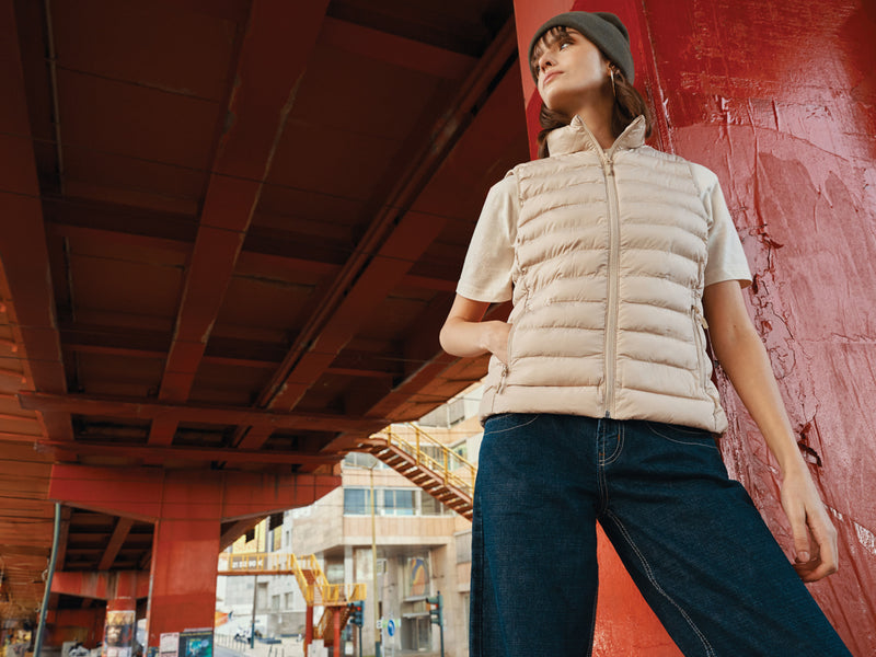 Load image into Gallery viewer, Mer women recycled polyester bodywarmer by iqoniq, lightweight textile with a sleek design, shown in a close-up shot.